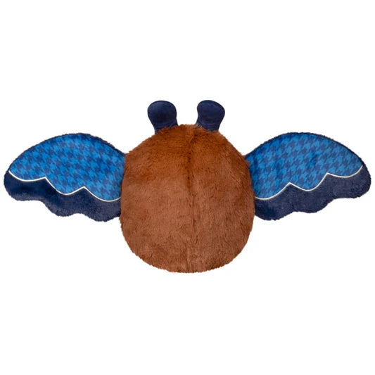 Back view of the Mini Cute Academia Mothman plush with its brown fuzzy body, dark blue antennae and outstretched blue houndstooth wings.